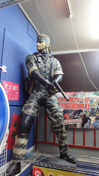 a statue of solid snake inside super potato